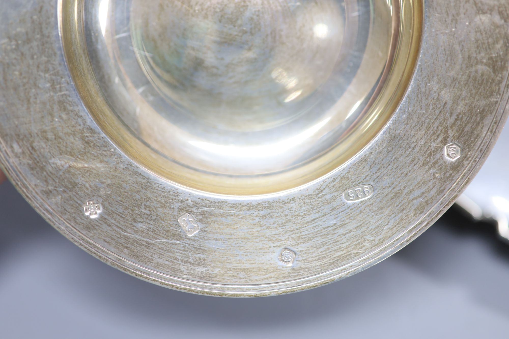 A circular silver waiter with piecrust edge, London 1961 and a modern silver (925) circular armada dish, 9.09oz.